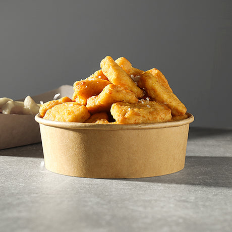 Kraft bowl filled with crispy fried chicken nuggets.