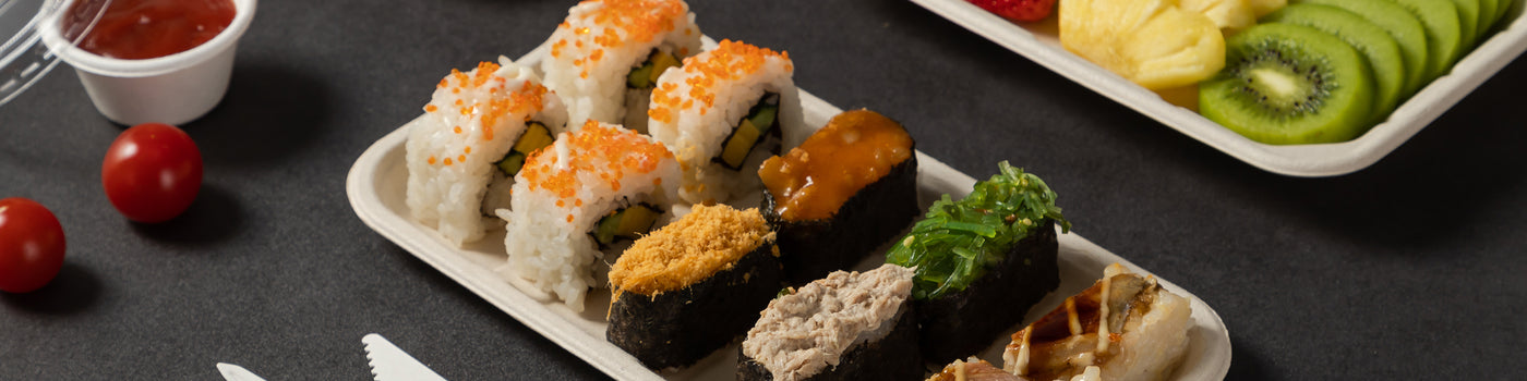 a variety of sushi placed on bagasse food tray