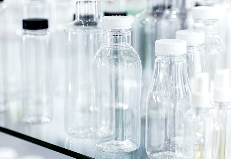 clear plastic bottles on production line